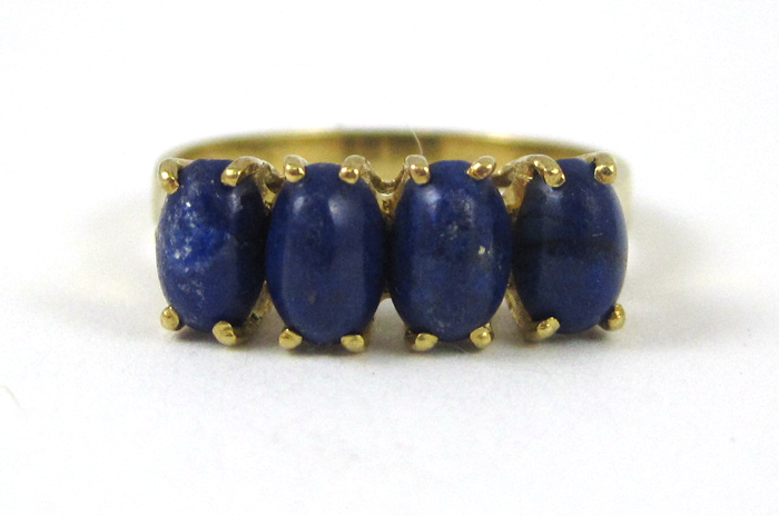 Appraisal: LAPIS LAZULI AND EIGHTEEN KARAT GOLD RING set with four