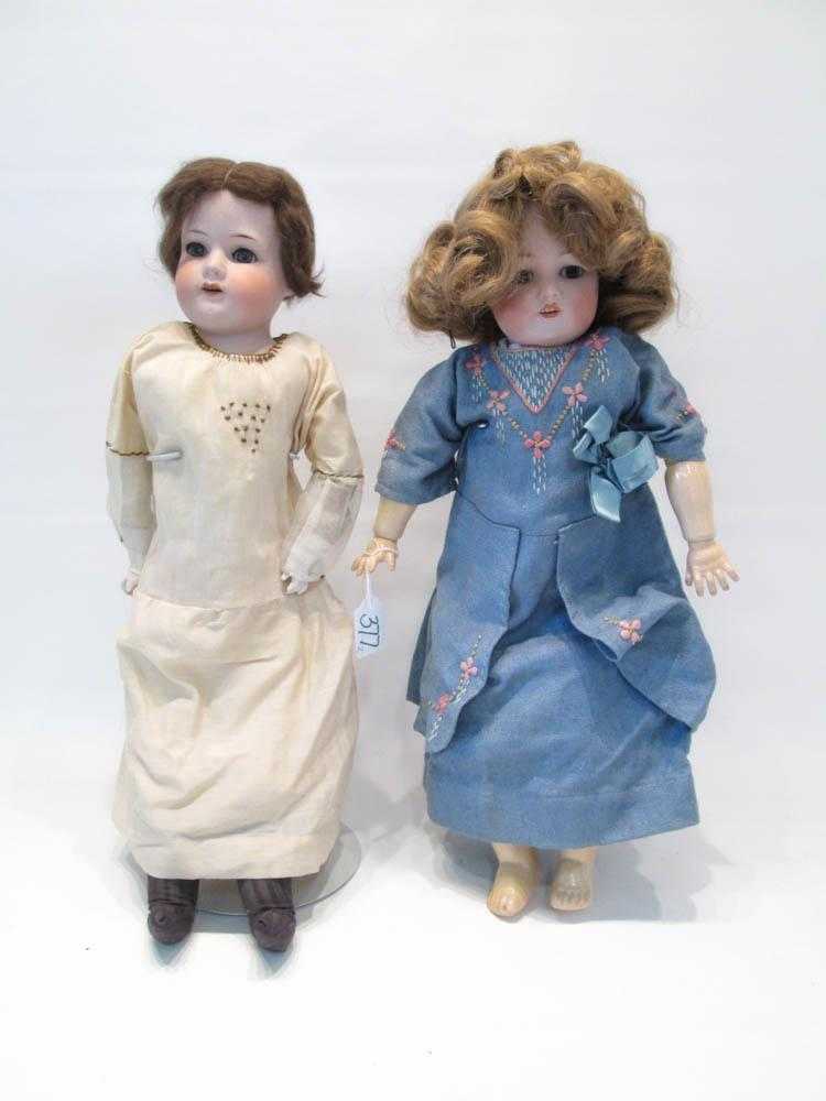 Appraisal: TWO GERMAN BISQUE HEAD DOLLS Armand Marseilles shoulder head doll