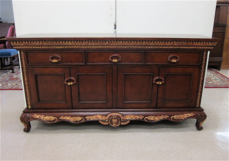 Appraisal: CARVED AND PARCEL-GILT MAHOGANY SIDEBOARD French Louis XV style the