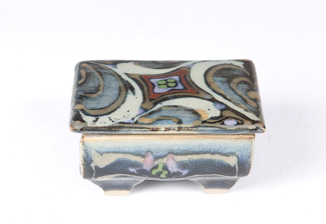 Appraisal: David Frith British b Box and coverdecorated with abstract motifsimpressed