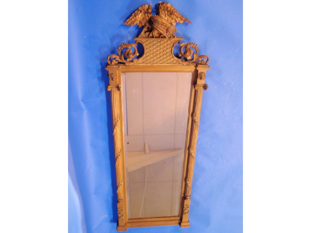 Appraisal: An antique Regency style gilt framed bevelled pier glass with