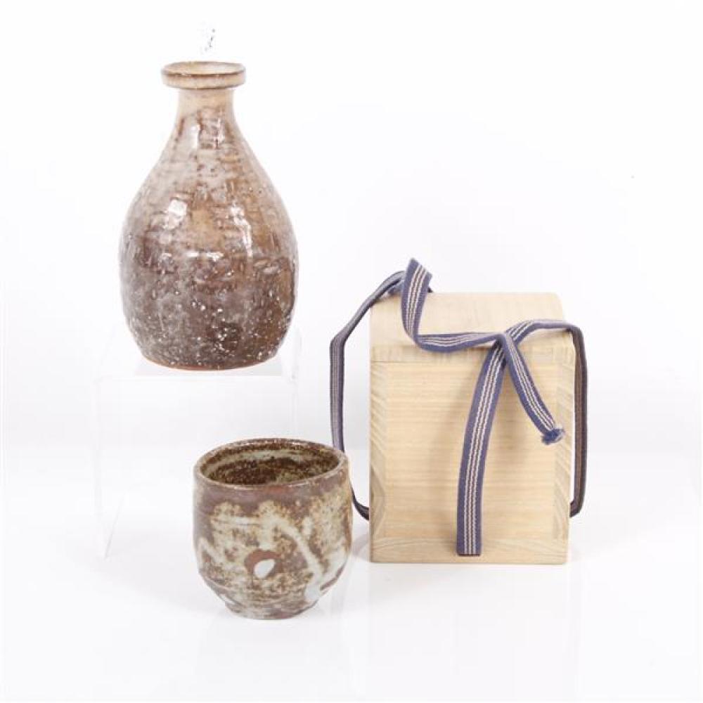 Appraisal: YOSHIDA YOSHIHIKO JAPANESE POTTERY SAKI CONTAINER AND TEACUP IN BOX