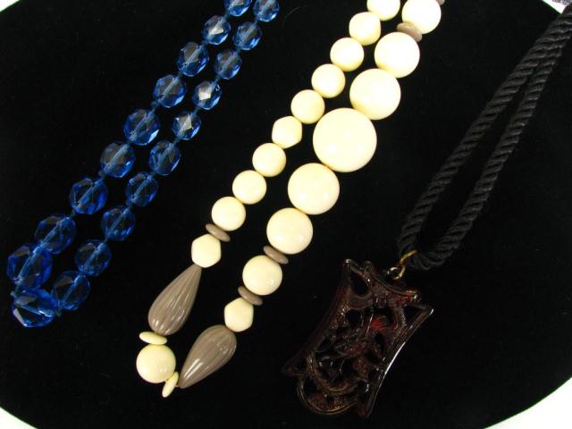 Appraisal: Group of three vintage necklaces including cream Bakelite with graduated