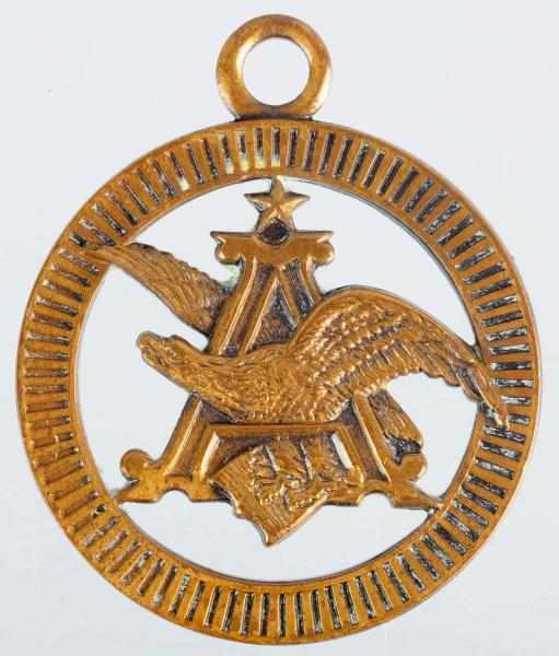 Appraisal: Anheuser-Busch Die-Cut Pendant Embossed Compliments of Budweiser on backside Some