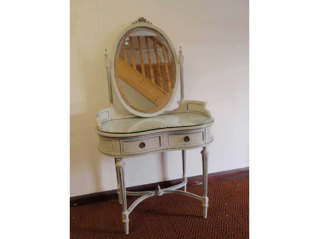 Appraisal: A Louis XVI style painted dressing table with oval mirror