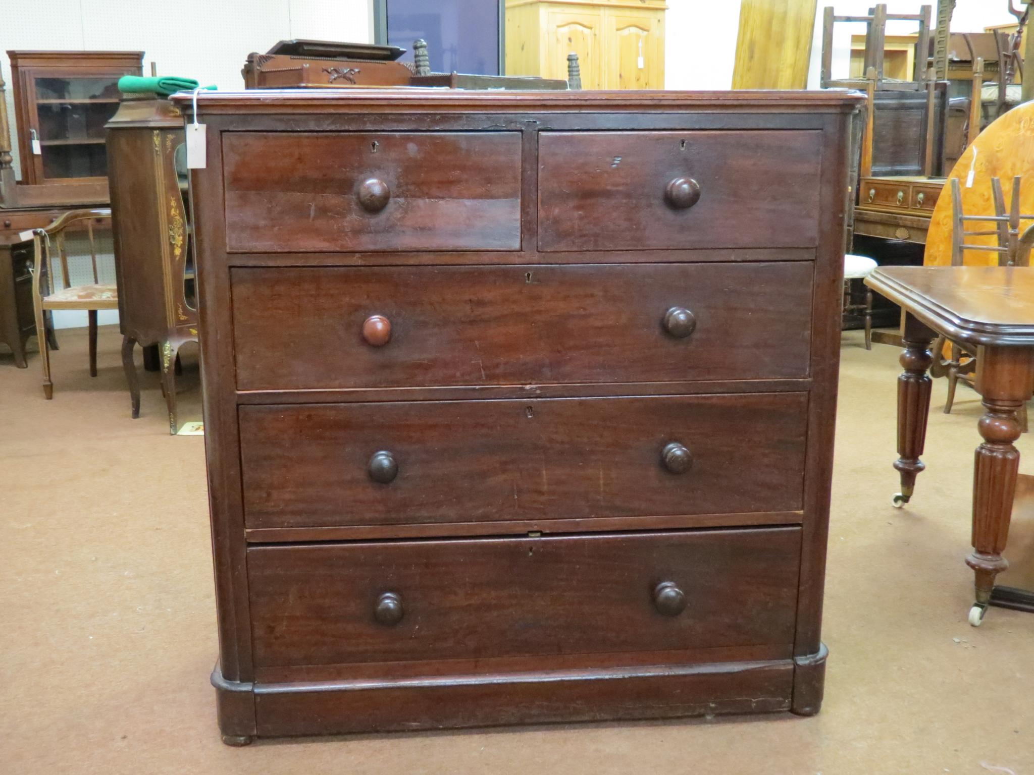 Appraisal: A Victorian mahogany chest two short and three long mahogany-lined