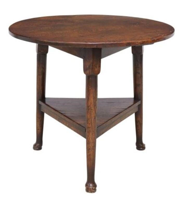 Appraisal: English oak cricket table th c round tabletop medial shelf