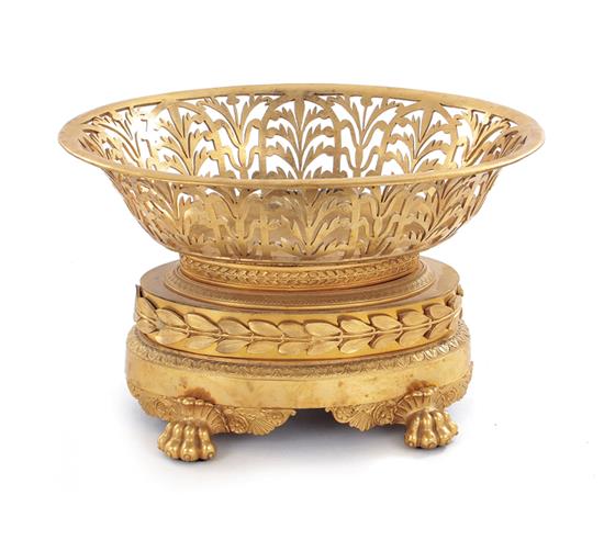 Appraisal: Charles X bronze dore centerpiece circa reticulated anthemion oval basket