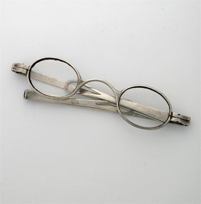 Appraisal: A pair of George III spectacles with folding arms one