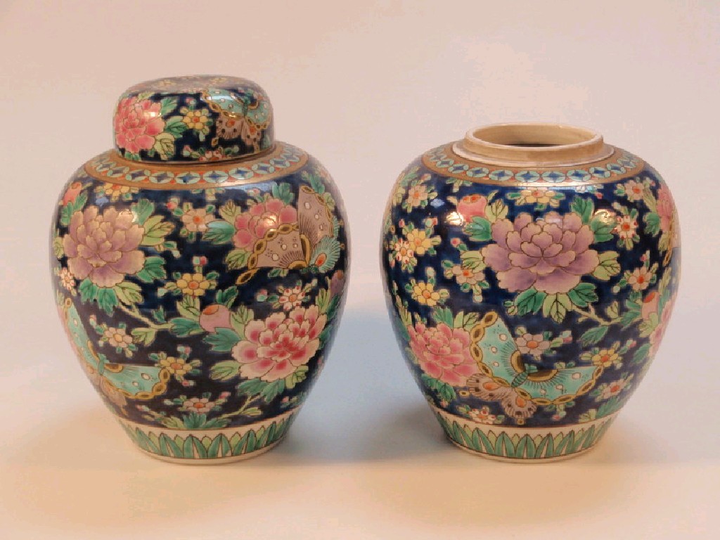 Appraisal: A pair of Chinese ginger jars richly enamelled with flowers