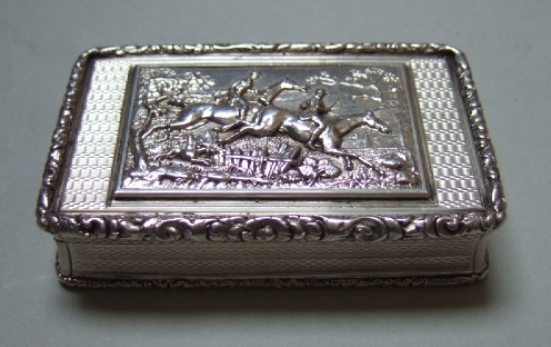 Appraisal: A silver rectangular hinge lidded snuff box the cover decorated