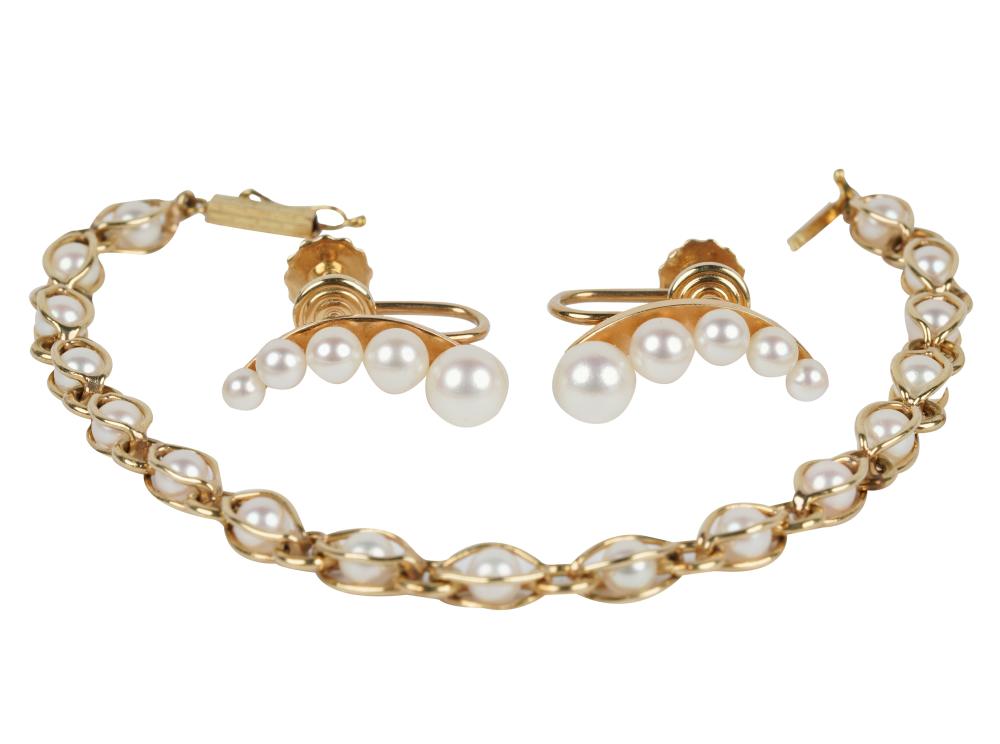 Appraisal: KARAT YELLOW GOLD EARCLIPS BRACELETthe bracelet containing round white cultured