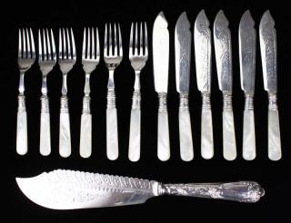 Appraisal: ornate silverplated fish slice and mother of pearl handled forks