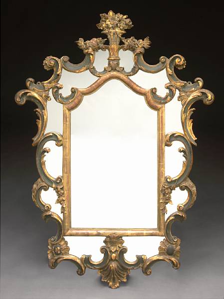 Appraisal: An Italian Baroque style parcel gilt and ebonized mirror fourth