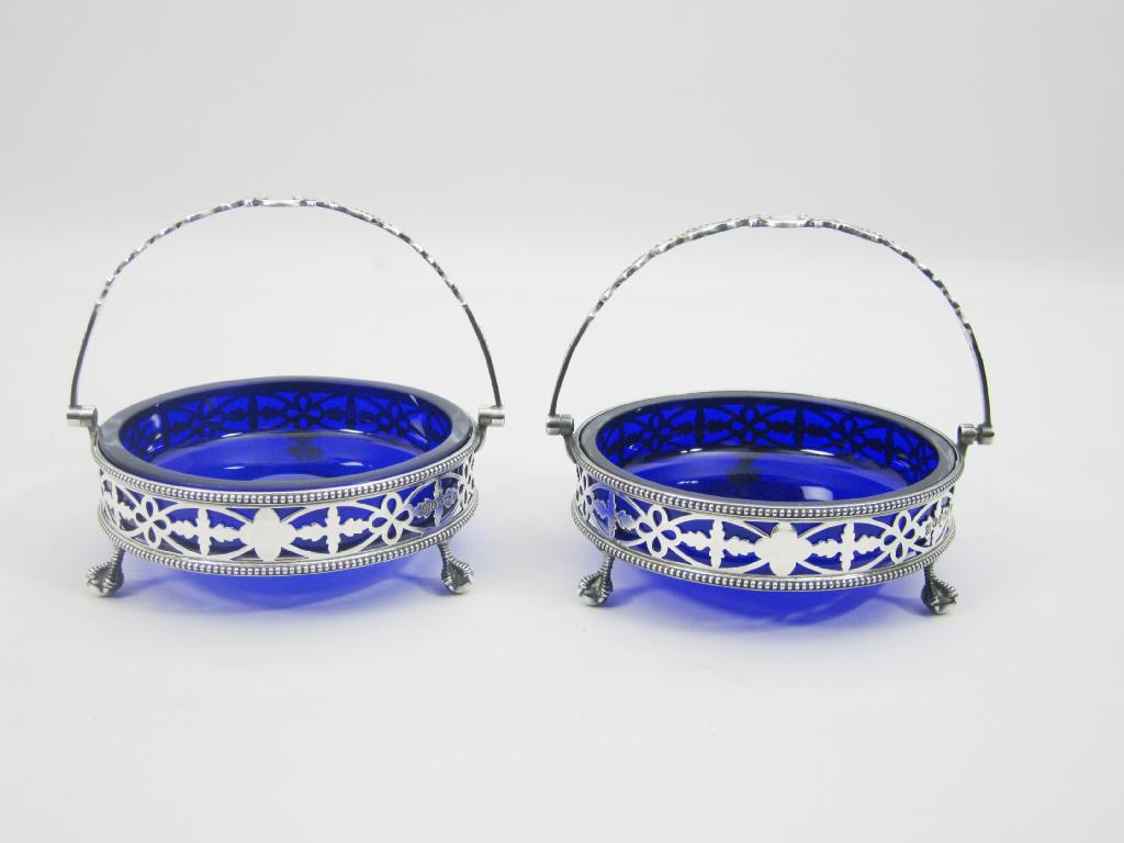 Appraisal: Pair of Victorian pierced circular Bon Bon Dishes with swing