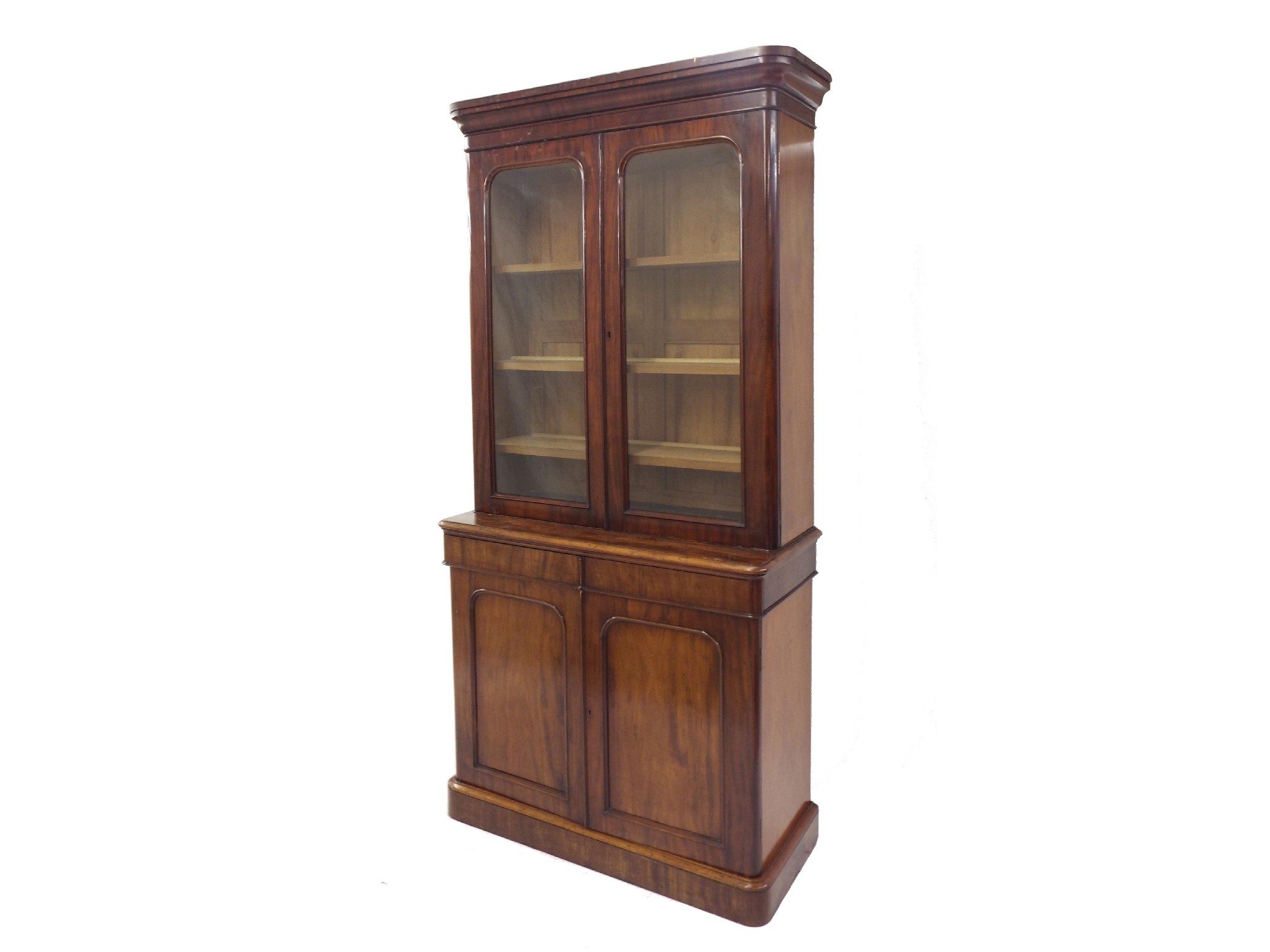 Appraisal: Victorian mahogany bookcase on stand the raised back with twin