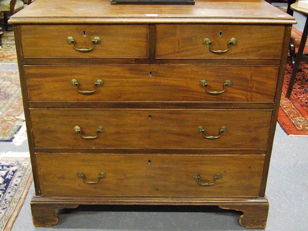 Appraisal: George III mahogany chest having two short over three long