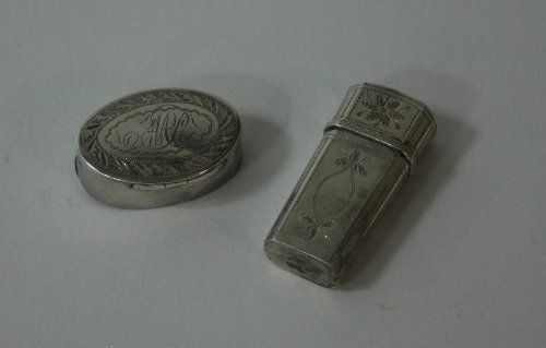 Appraisal: A small silver cased scent bottle Birmingham of tapering canted