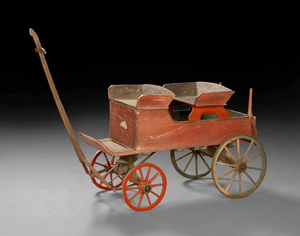 Appraisal: A child's farm wagon Of typical form the two seat