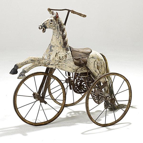 Appraisal: FIGURAL HORSE TRICYCLE Reproduction of th C child s toy