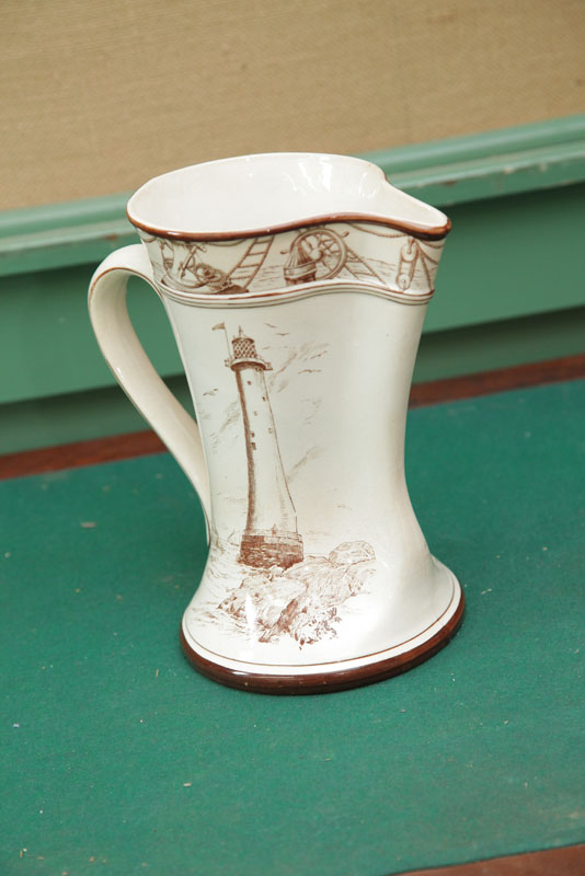 Appraisal: BUFFALO POTTERY PITCHER Brown and white transfer pitcher in ''Marine