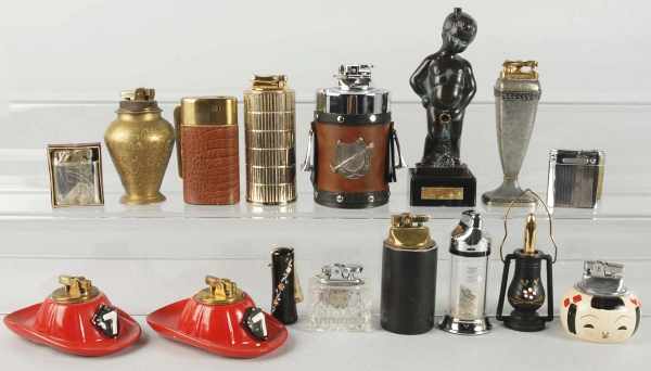 Appraisal: Lot of Approximately Figural Lighters Condition Good Size Largest -