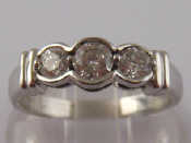 Appraisal: A carat white gold three stone diamond ring estimated total