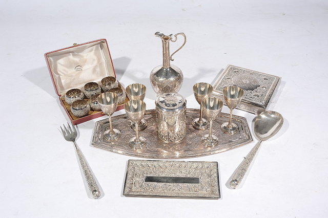 Appraisal: A COLLECTION OF CEYLONESE ENGRAVED SILVER to include a set