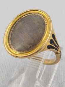 Appraisal: A yellow metal tests ct gold George III mourning ring