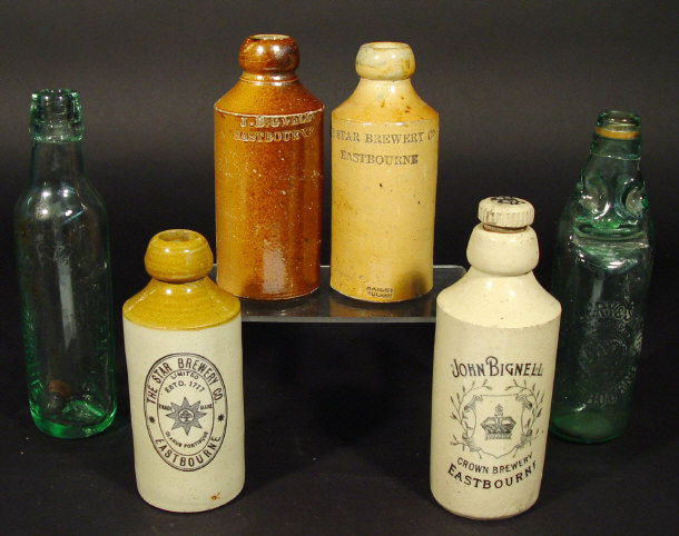 Appraisal: Four Eastbourne Brewery stoneware bottles and two Eastbourne glass bottles