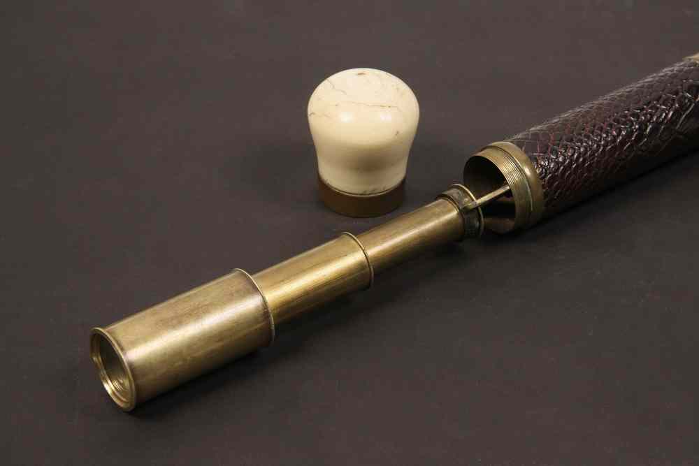 Appraisal: RARE IVORY HANDLED CANE WITH TELESCOPE - th c Twist-Off