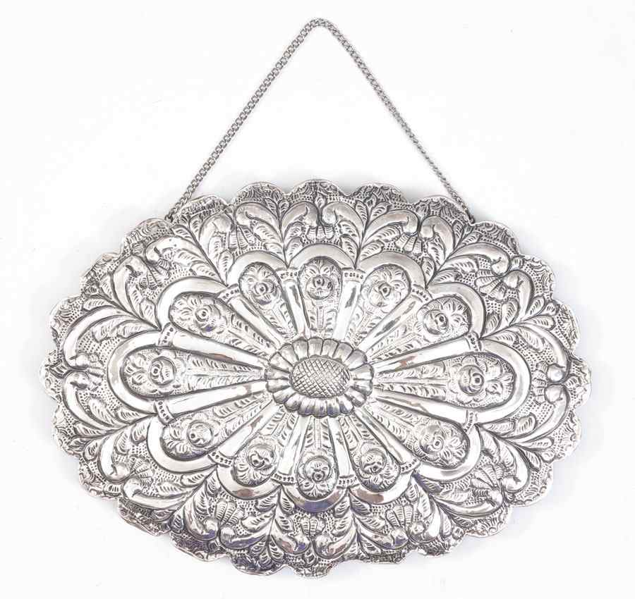 Appraisal: EMBOSSED STERLING FRAME MIRROR WITH CHAIN Engraved front with embossed