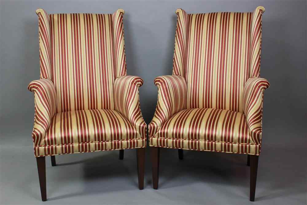 Appraisal: PAIR OF HEPPLEWHITE STYLE WING CHAIRS upholstered in a claret