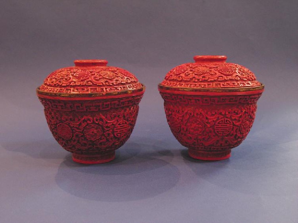 Appraisal: A FINE PAIR OF CHINESE CINNABAR LACQUER CUPS AND COVERS