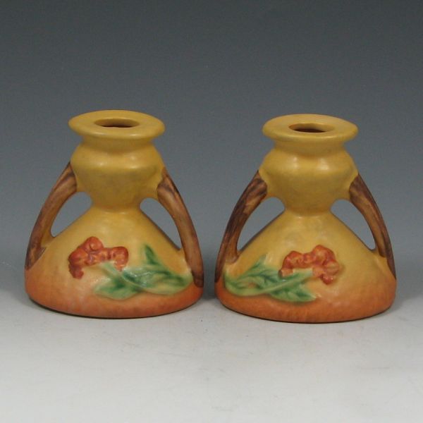 Appraisal: Pair of yellow Roseville Bittersweet candleholders Marked Roseville USA -