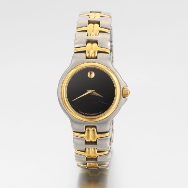 Appraisal: MOVADO K GOLD AND STAINLESS WATCH AND BRACELET mm case