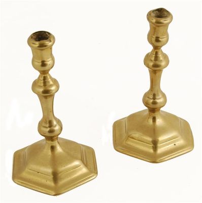 Appraisal: A pair of early th century brass hexagonal candlesticks with