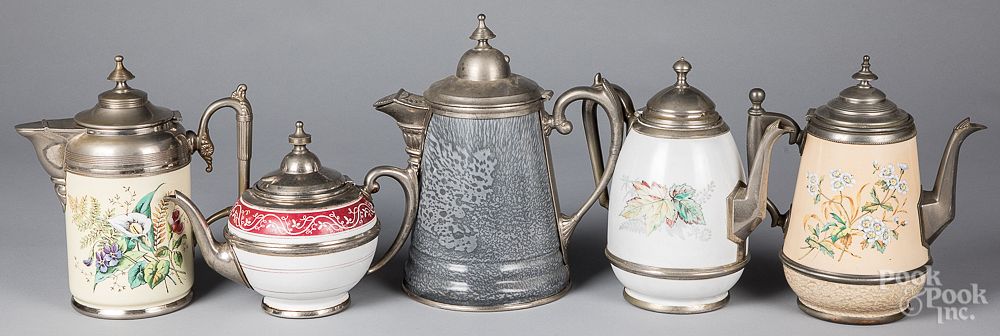 Appraisal: Five graniteware tea and coffee pots Five graniteware tea and