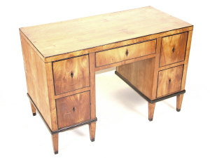 Appraisal: A Biedermeier ash kneehole desk circa of rectangular form with