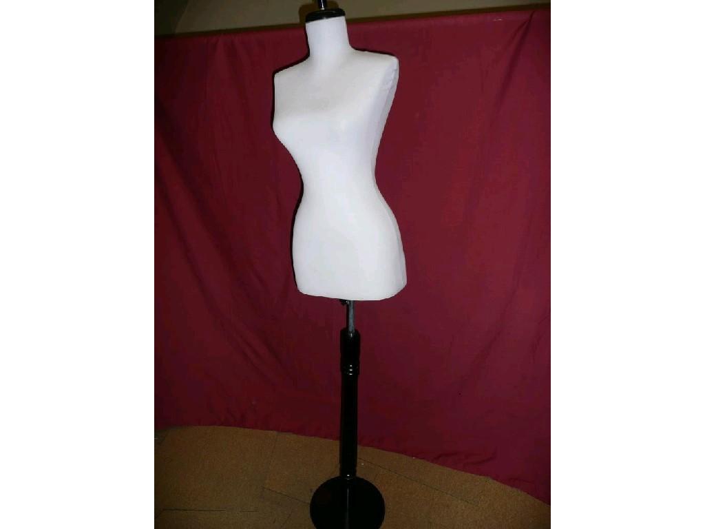 Appraisal: One female body mannequin on wooden pedestal