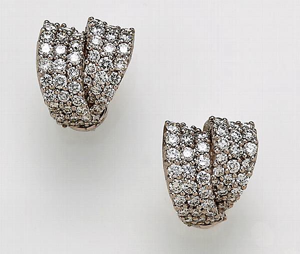 Appraisal: A pair of diamond and eighteen karat white gold half