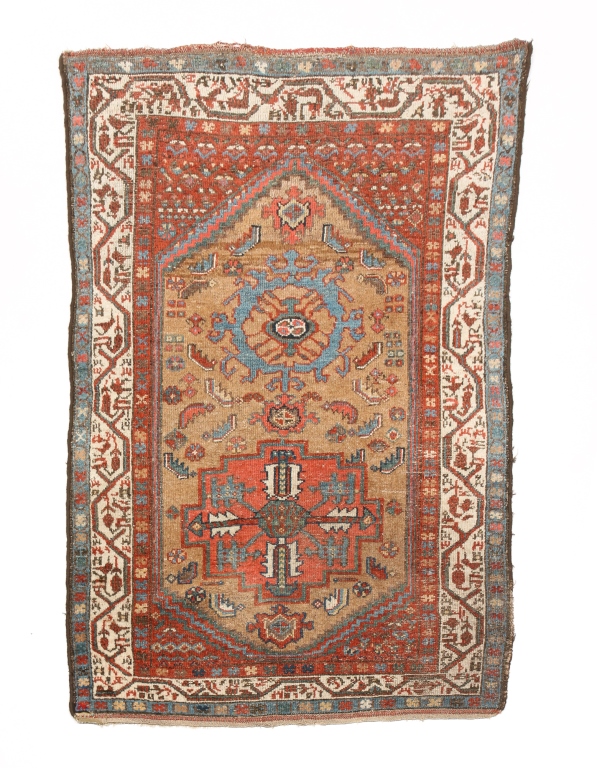 Appraisal: KURDISH RUG First quarter th century Red and blue medallions