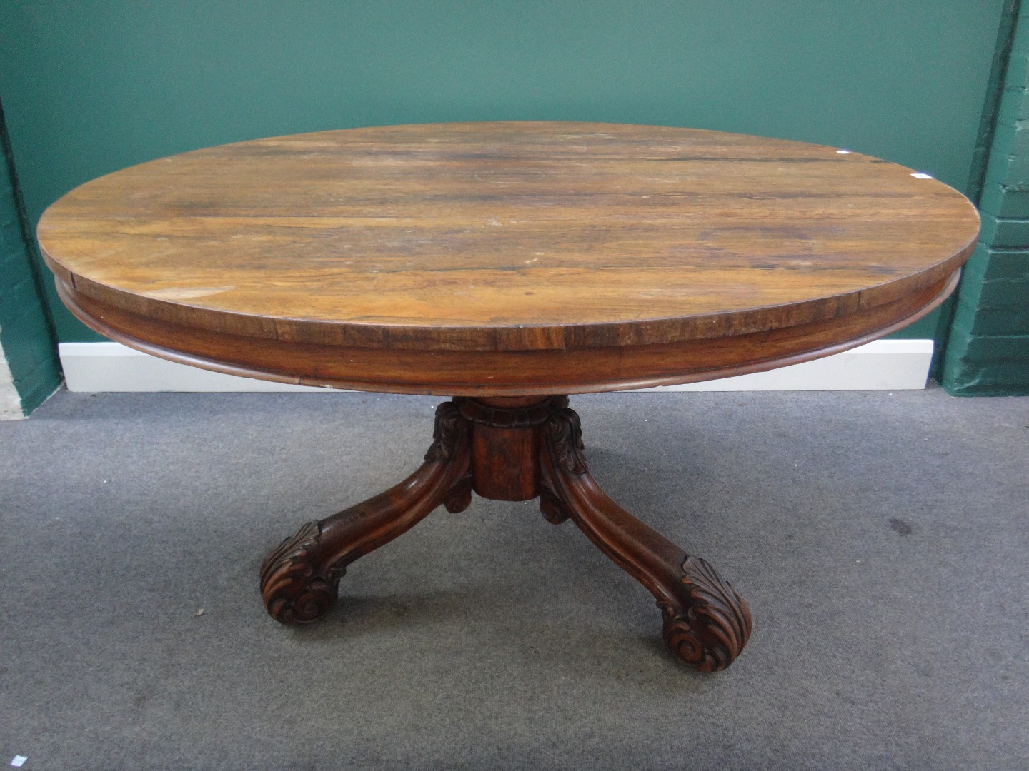 Appraisal: An early Victorian rosewood breakfast table the circular snap top