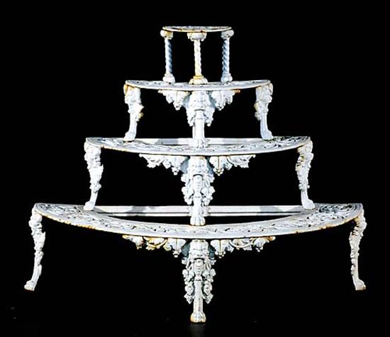 Appraisal: Victorian style cast-iron garden stand four-tiered with semi-circular pierced platforms