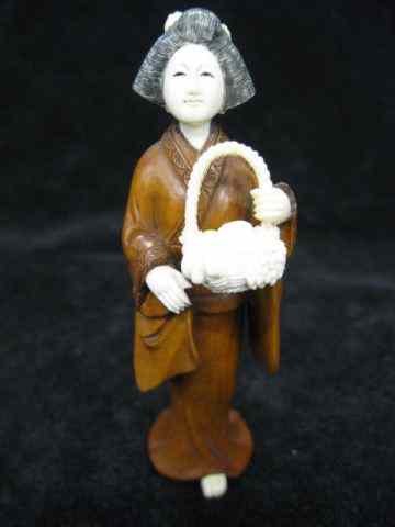 Appraisal: Carved Ivory Boxwood Figurine of a Geisha carrying a basket