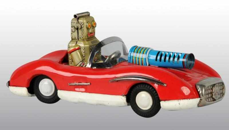 Appraisal: Tin Robot Driving Mercedes Friction Toy Description Japanese Working and