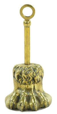 Appraisal: A Victorian cast brass lion's paw door stop in cm