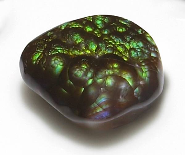 Appraisal: Fire Agate Cabochon Deer Creek Arizona A ring-sized stone this