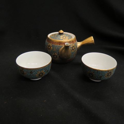 Appraisal: Japanese Porcelain Tea Set teapot with cups fine floral gold