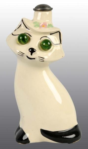 Appraisal: Cat with Green Marble Eyes Ironing Sprinkler Condition Near Mint